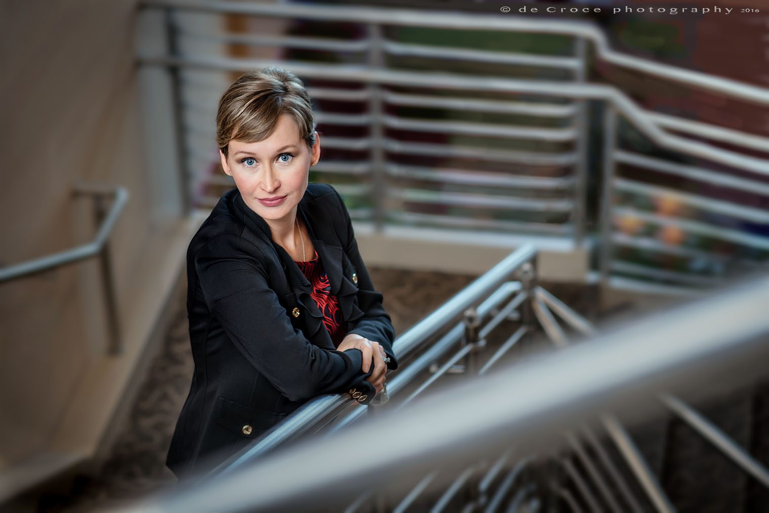 Executive woman portrait photo on stairs