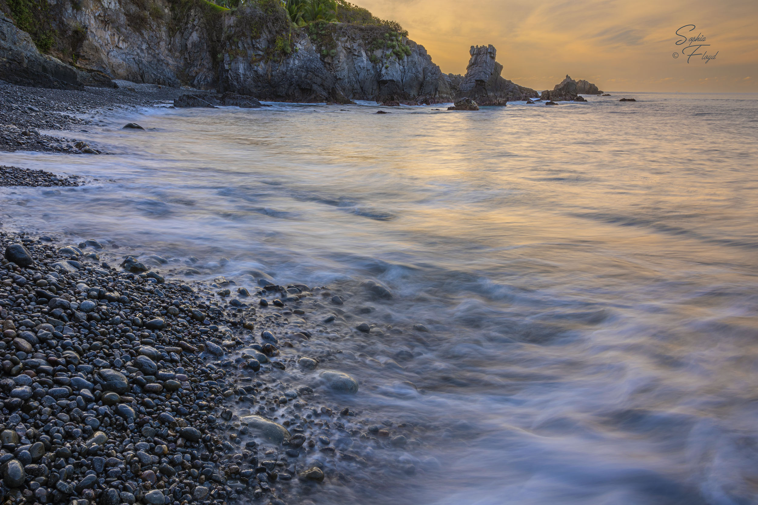 Landscape photographer Sophia Floyd depicts rocky shoreline in exquisite grace.
