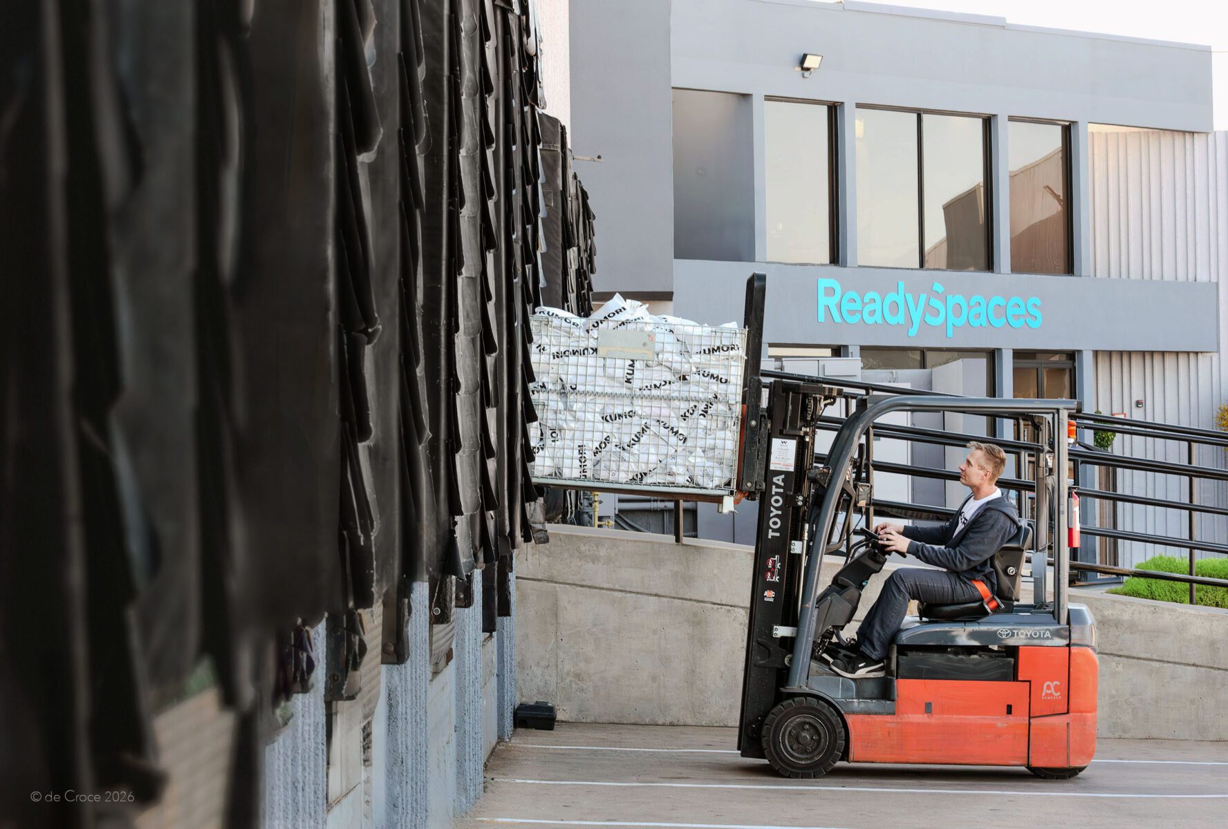 Commercial & advertising photographer catches visual image of worker at Ready Spaces docks in Denver Colorado